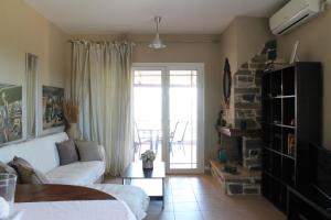 Postel nebo postele na pokoji v ubytování Aegina Villa Kalliopi + 16 fotografií