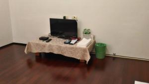 Televisor o centre d'entreteniment de Flower Memory Homestay