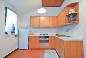 Kuchyňa alebo kuchynka v ubytovaní Apartmensts Nikola 1023