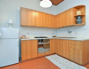 Kuchyňa alebo kuchynka v ubytovaní Apartmensts Nikola 1023