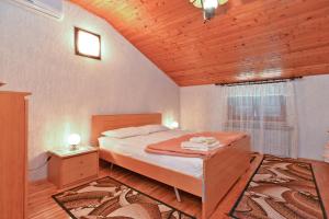 Posteľ alebo postele v izbe v ubytovaní Apartmensts Nikola 1023