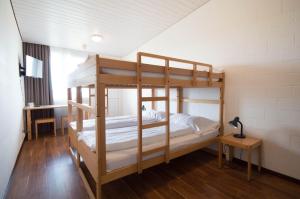 Ένα ή περισσότερα κρεβάτια σε δωμάτιο στο Hotel Bodensee-Arena