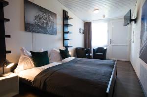 Ένα ή περισσότερα κρεβάτια σε δωμάτιο στο Hotel Bodensee-Arena