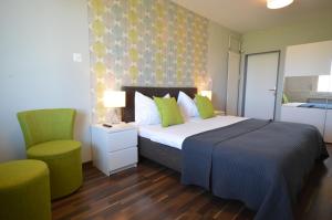 Ένα ή περισσότερα κρεβάτια σε δωμάτιο στο Hotel Bodensee-Arena