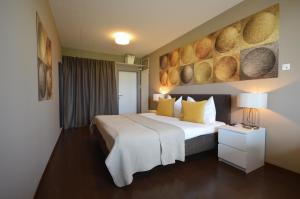Ένα ή περισσότερα κρεβάτια σε δωμάτιο στο Hotel Bodensee-Arena