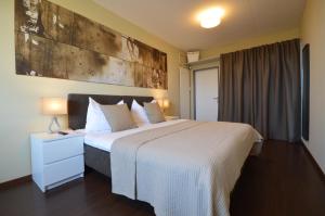 Ένα ή περισσότερα κρεβάτια σε δωμάτιο στο Hotel Bodensee-Arena