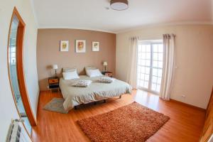 Llit o llits en una habitació de Liv In Ericeira Guest House