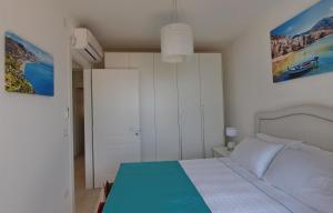A bed or beds in a room at Le Villette - Taormina