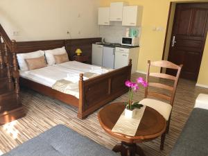 Kuchyň nebo kuchyňský kout v ubytování Mosoly Apartman