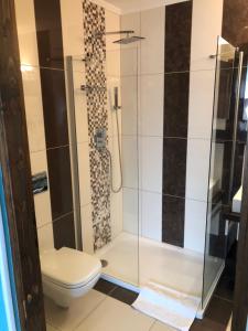 Koupelna v ubytování Mosoly Apartman