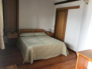 Postel nebo postele na pokoji v ubytování Agriturismo Bozica
