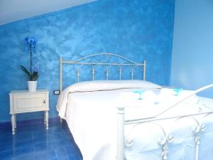 Postel nebo postele na pokoji v ubytování B&B Alòs + 11 fotografií