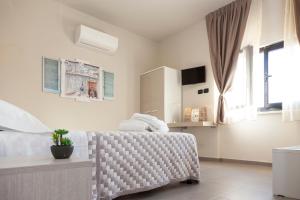 Posteľ alebo postele v izbe v ubytovaní Riviera HUB