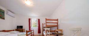 TV a/nebo společenská místnost v ubytování Guesthouse Šime