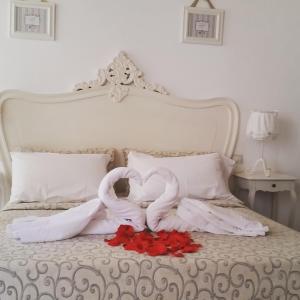 Posteľ alebo postele v izbe v ubytovaní B&B La Porta Vecchia