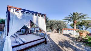 Кровать или кровати в номере Hoposa Costa D'or - Adults Only