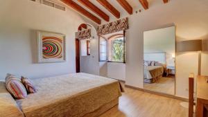 Кровать или кровати в номере Hoposa Costa D'or - Adults Only