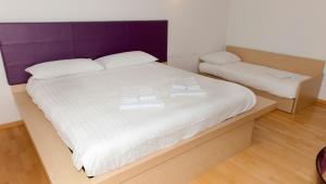 Postel nebo postele na pokoji v ubytování Hotel Pramaggiore