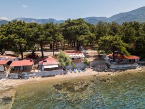 an aerial view of a resort on a beach at Sunrise Studio in Skala Kallirachis +9 photos