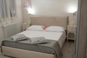 Postel nebo postele na pokoji v ubytování Casa fioRita