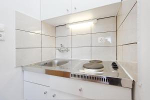 Kuchyň nebo kuchyňský kout v ubytování Apartments Crnjac