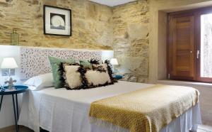 Cama o camas de una habitación en Numa Rúa Travesa