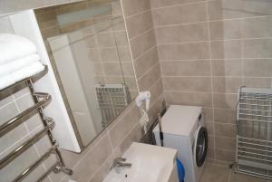 Ένα μπάνιο στο Апартаменты в Одессе +18 φωτογραφίες