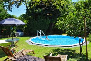 Bazén v ubytovaní La Martellina B&B alebo v jeho blízkosti