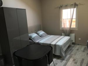 Postel nebo postele na pokoji v ubytování Appartements "Le 102"