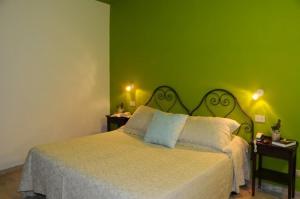 Letto o letti in una camera di Albergo Duomo
