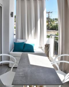 Posezení v ubytování Angelos Boutique Suites + 135 fotografií