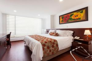 Posteľ alebo postele v izbe v ubytovaní Hotel Cuellars