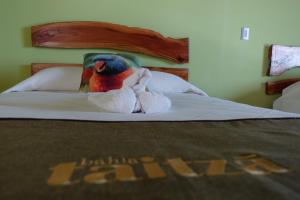 Postel nebo postele na pokoji v ubytování Hotel Bahia Taitza