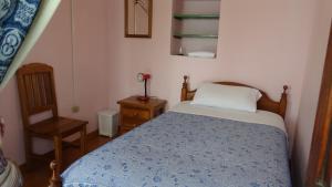 Letto o letti in una camera di Travellers Inn