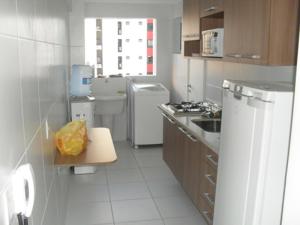 Nhà bếp/bếp nhỏ tại Condominio jtr brasil