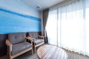 Posezení v ubytování Enoca Hotel