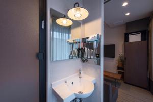 Kuchyň nebo kuchyňský kout v ubytování Enoca Hotel + 37 fotografií