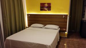 Letto o letti in una camera di Sunway Residence