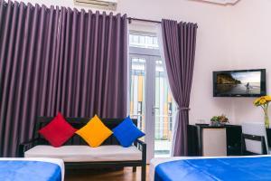 TV a/nebo společenská místnost v ubytování Blue Star Hotel