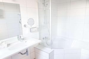 Vannituba majutusasutuses Best Western Plus Aldhem Hotel