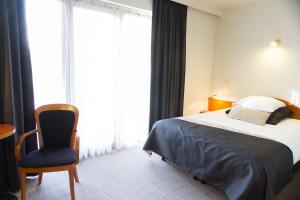 Voodi või voodid majutusasutuse Best Western Plus Aldhem Hotel toas