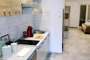 Kuchyňa alebo kuchynka v ubytovaní Exit Apartments