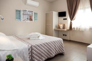 Posteľ alebo postele v izbe v ubytovaní Riviera HUB
