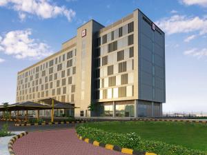 uma representação de um hotel com um edifício em Millennium Madinah Airport em Al Madinah