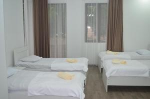 Katil atau katil-katil dalam bilik di Lia Guest House