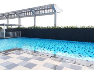 Kolam renang di atau dekat dengan Apartment Cosmo Terrace +4 gambar
