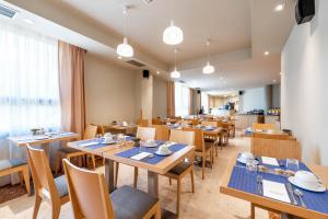 Restaurace v ubytování Aparthotel Exe Campus San Mamés