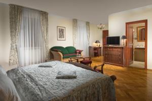 TV o dispositivi per l'intrattenimento presso Boutique Hotel Constans