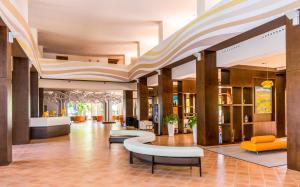 a lobby of a hotel with couches and chairs at TUI Blue Isla Cristina Palace - Adults Recommended in Isla Cristina