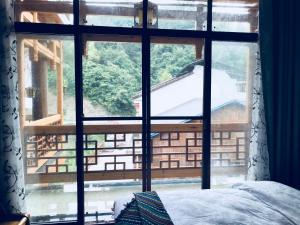遇见·子云涧客栈（杨家界门票站）客房内的一张或多张床位